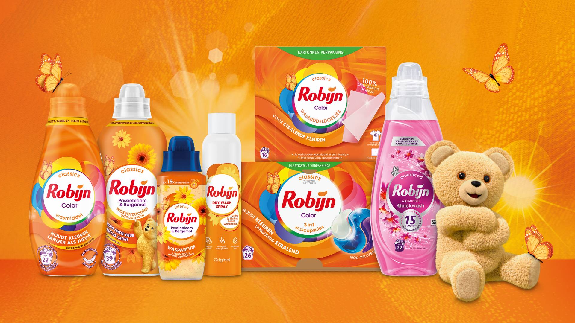 Op de banner is het robijn beertje te zien met verschillende producten van Robijn in oranje.